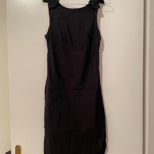 Shine 2gether dress used, black fitted with bows