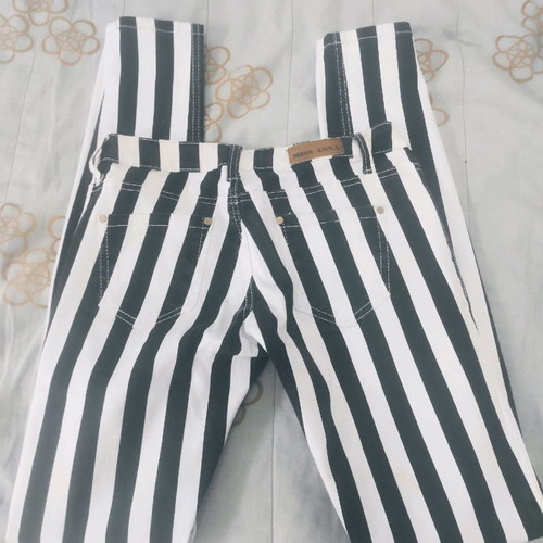 Women's black and white jeans size 36 with vertical stripes