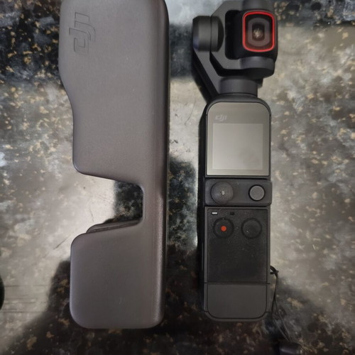 DJI Osmo Pocket 2 like new with tripod and phone holder set