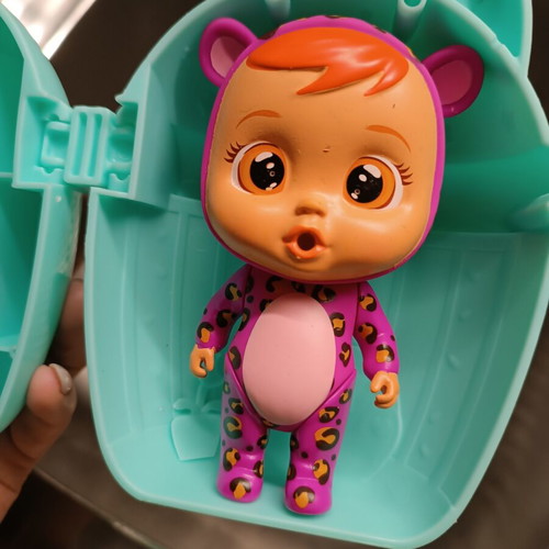 Cry Babies Magic Tears doll like new with bottle-shaped house and accessories