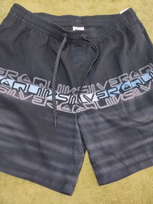 Quicksilver men's swim shorts size Medium like new, black and blue