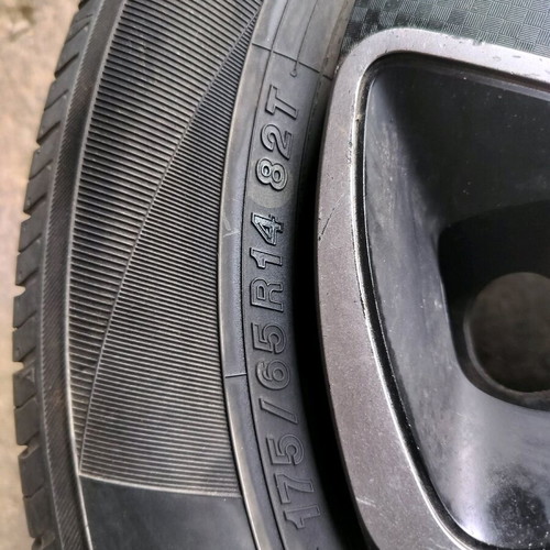 Yokohama tires 175/65/14 with steel rims and hubcaps like new