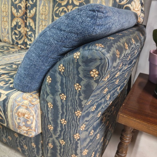 Two-seater sofa with storage compartment