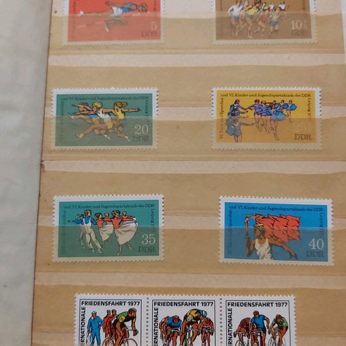 Mini album 16 pages like new with 36 unsealed series from East Germany