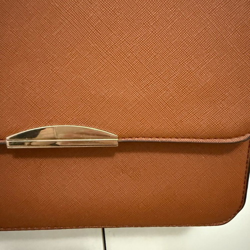 Small tan crossbody bag lightly used