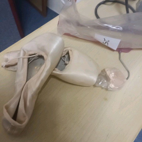 Banners, gaiters and ballet shoes like new from dance school closing