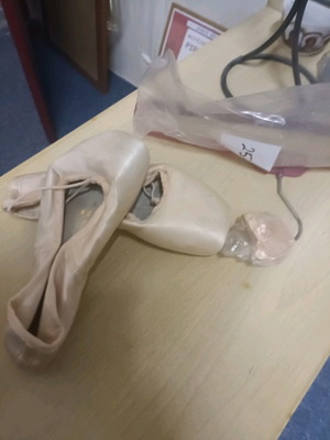 Banners, gaiters and ballet shoes like new from dance school closing