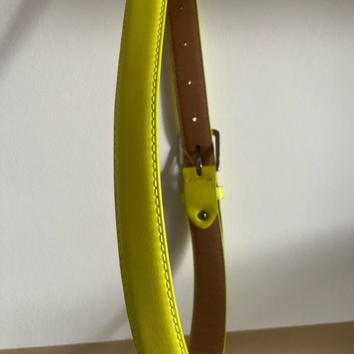 Women’s belt light green yellow with silver buckle like new, size S-M