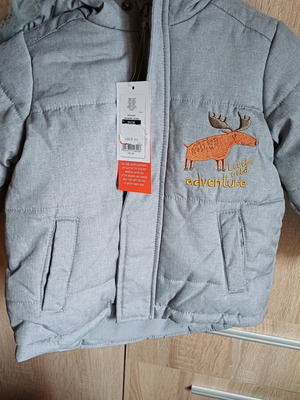 Baby jacket new for 2 years, warm and waterproof with neutral design
