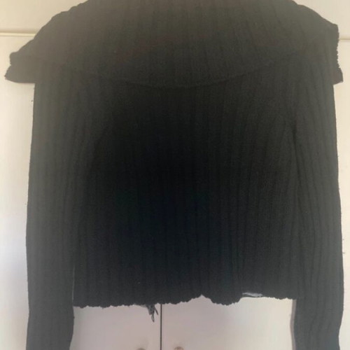 Vintage leather jacket used with knitted wool sleeves and embroidered details