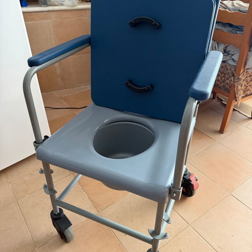 Cyan Mobik Shower Chair like new with container