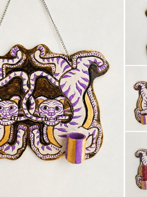 Ceramic ornament candle holder handmade, hangs from wall
