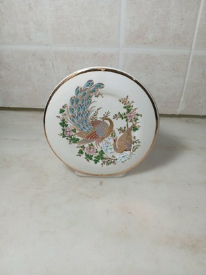 Ceramic wall vase with decorative peacock motif like new
