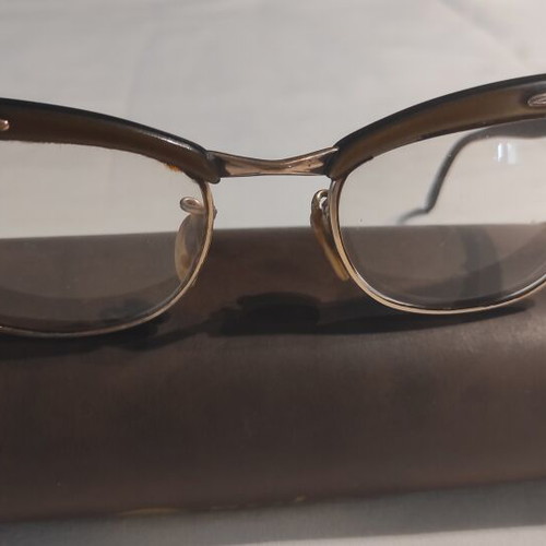 Vintage eyeglasses used, gold color with old case