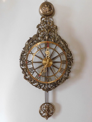 Bronze wall clock used, analog