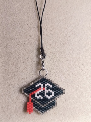 Graduation keychain new, black and white