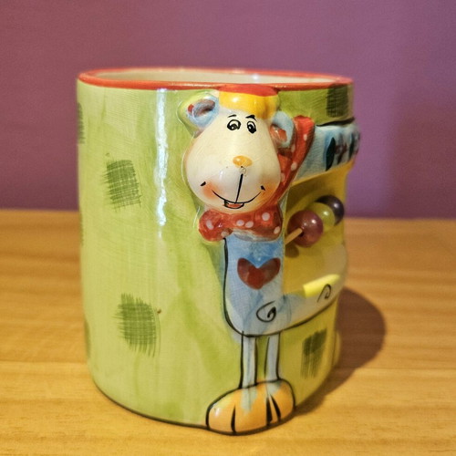 Children's mug used with lamb and abacus design
