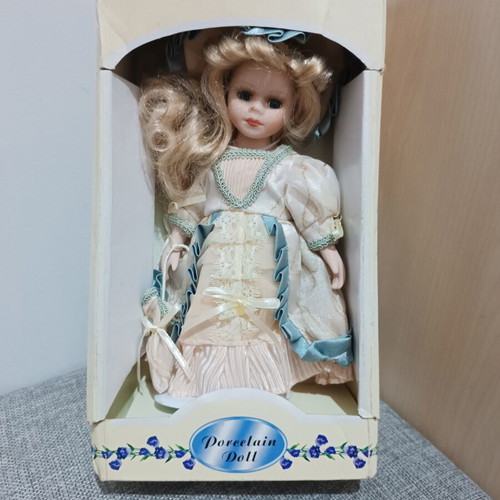Porcelain doll decorative, new, 25 cm height