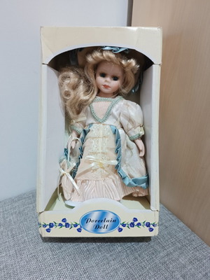 Porcelain doll decorative, new, 25 cm height