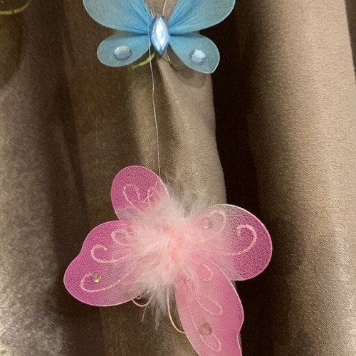 Decorative butterflies like new, yellow, pink, and sky blue for crafts