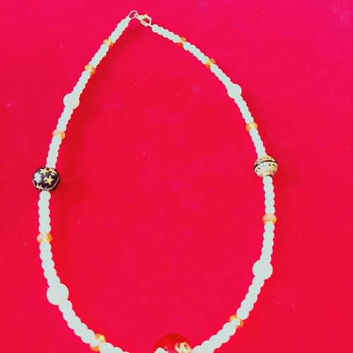 Apefthon necklace with white pearls and honey stones