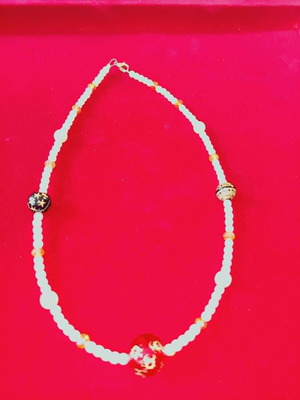 Apefthon necklace with white pearls and honey stones