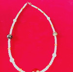 Apefthon necklace with white pearls and honey stones