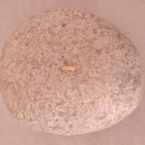 Vintage decorative candle shaped like a pebble, like new