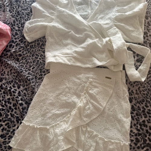 Regalinas white skirt and top set like new