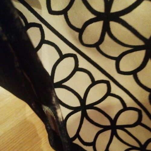 Tight mini dress used with velvet details in beige and black