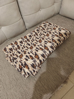 Sofa throw used with small hole
