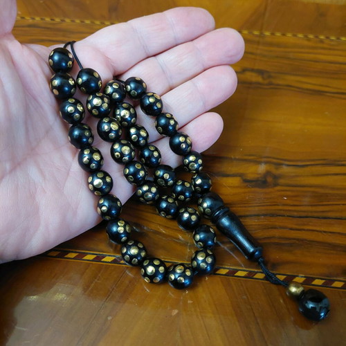 Worry beads with 33 ebony beads and golden copper inlays new