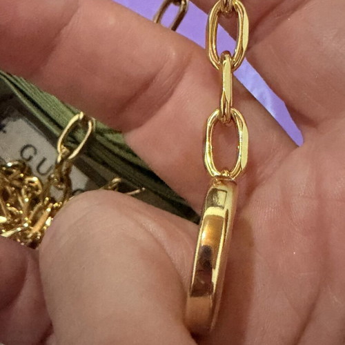 Gucci gold necklace with large GG pendant and chain, new
