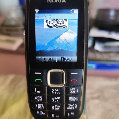 Nokia 1616-2 used with charger and new battery