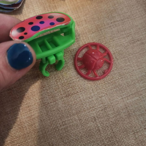 Kinder toy ring that throws ladybug disc like new