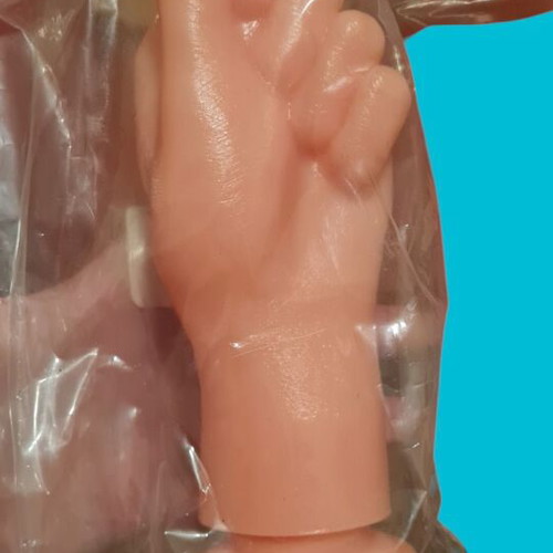 Adult fist toy new, sealed packaging