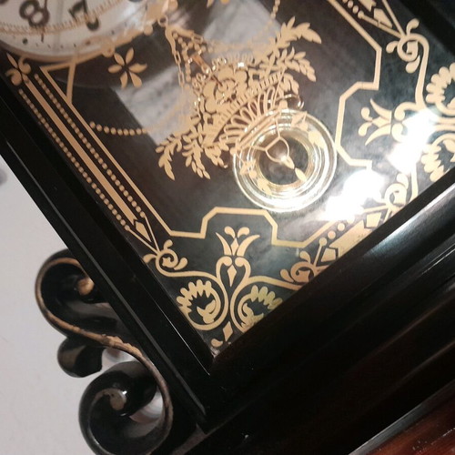 Antique wall clock hanging used