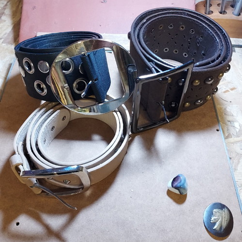 Three belts new with silver studs and stars
