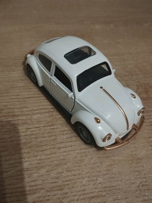 Vintage scarab miniature like new with battery