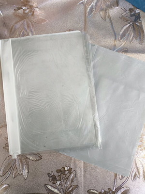 Set of three used folders
