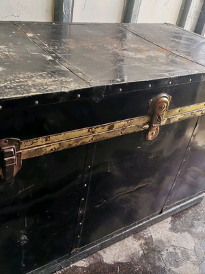 Old large trunk used with blue interior and 2 shelves