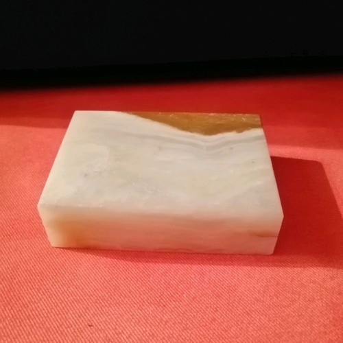 Envelope stand and alavastrine pouch.