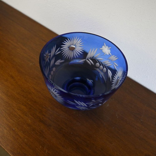 Blue crystal bowl used with cut glass sunflower and leaf design