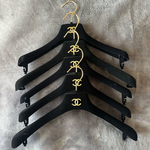 Chanel set of 5 new hangers with metal CC logo