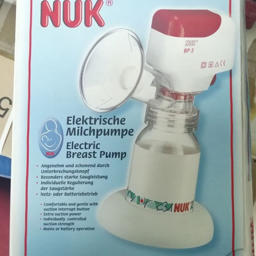NUK breast pump like new with power cable and adapter