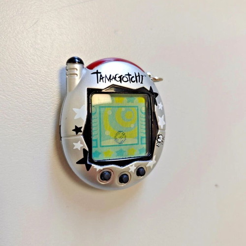 Tamagotchi Connection V3 Silver Star 2004 like new