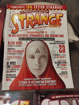Strange magazine pack of 7 issues with Tesla book like new