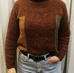 Brown sweater with subtle side colors, warm