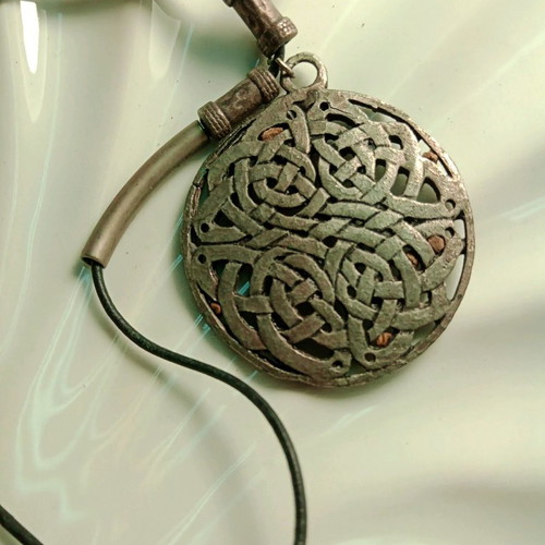 Pendant Celtic design like new with black adjustable leather strap