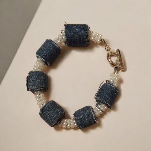 Handmade denim bracelet with beads and decorative clasp